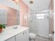 Bathroom with a single sink vanity and a shower/tub combo at 188 Broadmoor Ln, Rotonda West, FL 33947