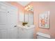 Small bathroom with a single vanity and toilet at 188 Broadmoor Ln, Rotonda West, FL 33947