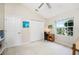 Bright bedroom with double closets and window overlooking the backyard at 188 Broadmoor Ln, Rotonda West, FL 33947