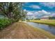 Waterfront property with canal view and mature trees at 188 Broadmoor Ln, Rotonda West, FL 33947