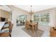 Spacious dining area with access to pool and Gathering room at 188 Broadmoor Ln, Rotonda West, FL 33947