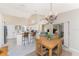 Bright kitchen features stainless steel appliances and a breakfast bar at 188 Broadmoor Ln, Rotonda West, FL 33947
