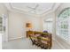 Bright home office features built-in shelving and window views at 188 Broadmoor Ln, Rotonda West, FL 33947