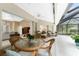 Spacious pool area with a view of the living room at 188 Broadmoor Ln, Rotonda West, FL 33947