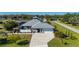 Single-Gathering home with metal roof, large driveway and fenced backyard at 2329 Pinellas Dr, Punta Gorda, FL 33983