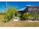 Landscaped backyard with a garden and tropical plants at 2329 Pinellas Dr, Punta Gorda, FL 33983