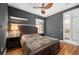Bedroom with queen bed, ceiling fan and en-suite bathroom at 2329 Pinellas Dr, Punta Gorda, FL 33983