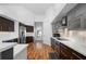 Modern kitchen with stainless steel appliances and hardwood floors at 2329 Pinellas Dr, Punta Gorda, FL 33983