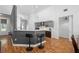 Modern kitchen with an island, stainless steel appliances, and hardwood floors at 2329 Pinellas Dr, Punta Gorda, FL 33983