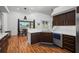 Eat-in kitchen with island, stainless steel appliances, and hardwood floors at 2329 Pinellas Dr, Punta Gorda, FL 33983
