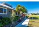 Landscaped walkway leading to home entrance, tropical plants at 2329 Pinellas Dr, Punta Gorda, FL 33983