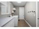 Laundry room with washer, dryer, and built-in cabinetry at 2329 Pinellas Dr, Punta Gorda, FL 33983