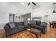Open living room with hardwood floors, comfortable seating, and kitchen views at 2329 Pinellas Dr, Punta Gorda, FL 33983