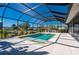 Inviting screened pool with ample deck space at 2329 Pinellas Dr, Punta Gorda, FL 33983