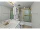 Bathroom with shower/tub combo and white vanity at 25188 Marion Ave # D205, Punta Gorda, FL 33950