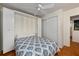 Bedroom with a murphy bed and double closets at 25188 Marion Ave # D205, Punta Gorda, FL 33950