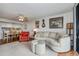 Open concept living area with adjacent dining and kitchen at 25188 Marion Ave # D205, Punta Gorda, FL 33950