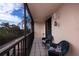 Enjoyable screened balcony with seating and tranquil surroundings at 25188 Marion Ave # D205, Punta Gorda, FL 33950