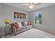 Cozy bedroom with a brown couch and large window, offering natural light at 2561 Sheila Ln, North Port, FL 34286