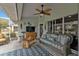 Relaxing screened porch with wicker furniture and ceiling fan at 2577 Mauritania Rd, Punta Gorda, FL 33983