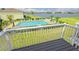 Balcony overlooking pool and lake at 26346 Rampart Blvd # 904, Punta Gorda, FL 33983
