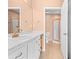 Bathroom with single sink vanity and shower at 26346 Rampart Blvd # 904, Punta Gorda, FL 33983