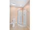 Bathroom with toilet and corner shower at 26346 Rampart Blvd # 904, Punta Gorda, FL 33983