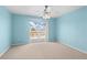 Bedroom with sliding glass doors to balcony at 26346 Rampart Blvd # 904, Punta Gorda, FL 33983