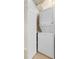 Stackable washer and dryer in a small laundry closet at 26346 Rampart Blvd # 904, Punta Gorda, FL 33983