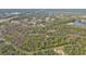 Aerial view of property near highway, showing home and landscape at 3000 Narcissus Ter, North Port, FL 34286