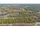 Aerial view of property with lake nearby at 3000 Narcissus Ter, North Port, FL 34286
