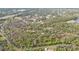 Aerial view of property near highway, showing home and landscape at 3000 Narcissus Ter, North Port, FL 34286