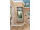 Corner glass shower with built-in seat and window at 3000 Narcissus Ter, North Port, FL 34286