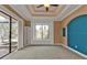 Spacious bedroom with built-in shelving and pool view at 3000 Narcissus Ter, North Port, FL 34286