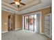 Bright bedroom with sliding doors leading to patio at 3000 Narcissus Ter, North Port, FL 34286