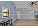 Common area with two barstools and a view of the kitchen at 3000 Narcissus Ter, North Port, FL 34286