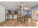 Open concept kitchen and dining area with bar at 3000 Narcissus Ter, North Port, FL 34286