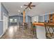Open floor plan with tiled floors and a bar at 3000 Narcissus Ter, North Port, FL 34286