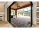 Spacious enclosed patio with paver stones and access from sliding glass doors at 3000 Narcissus Ter, North Port, FL 34286