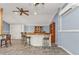 Kitchen with bar seating and modern appliances at 3000 Narcissus Ter, North Port, FL 34286