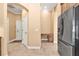 Well-lit kitchen area with built-in desk and pantry at 3000 Narcissus Ter, North Port, FL 34286