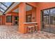 Outdoor patio bar with brick pavers and pool views at 3000 Narcissus Ter, North Port, FL 34286