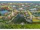 Aerial view of waterfront home with private dock and boat at 3513 Terin Ct, Punta Gorda, FL 33950