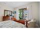 Bedroom with water views and access to patio at 3513 Terin Ct, Punta Gorda, FL 33950