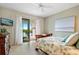 Bedroom with water views and sliding glass doors to patio at 3513 Terin Ct, Punta Gorda, FL 33950