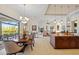 Bright dining room with water views and sliding doors to patio at 3513 Terin Ct, Punta Gorda, FL 33950