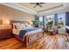 Spacious main bedroom with hardwood floors and water views at 3513 Terin Ct, Punta Gorda, FL 33950