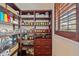 Well-organized pantry with ample shelving for storage at 3513 Terin Ct, Punta Gorda, FL 33950