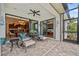 Covered patio with seating area and views of the house at 3513 Terin Ct, Punta Gorda, FL 33950