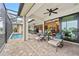 Spacious patio with pool access and views of the canal at 3513 Terin Ct, Punta Gorda, FL 33950